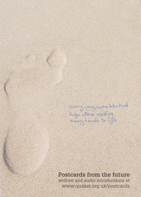 a poem written in ink on a photo of a footprint made in sand
